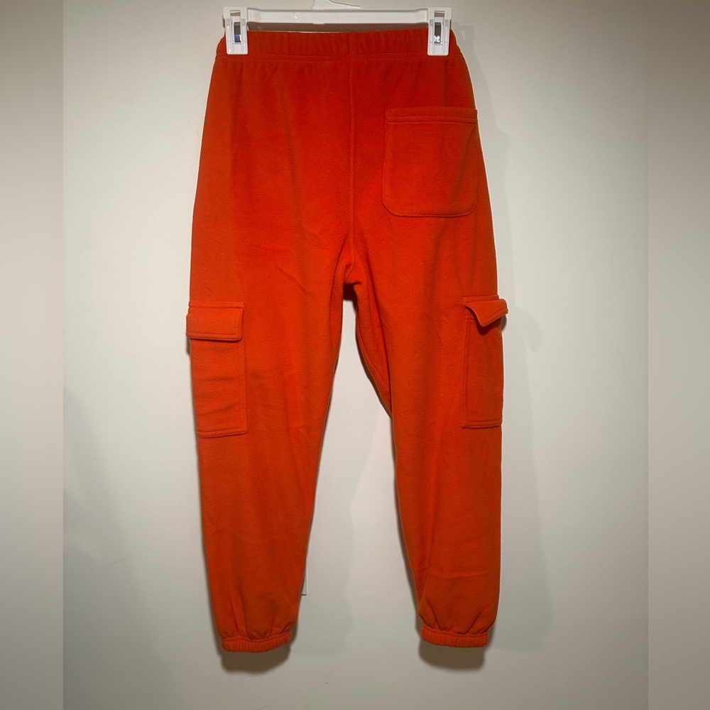 Bright Orange Fleece Sweatpants Size XS, I’m 5’6 and they fit pretty snug !